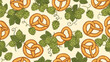 © Mohashin - Traditional German food pattern featuring salted golden pretzels and green hop plants with leaves on a light cream colored background.