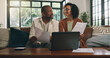 © WesJVR/peopleimages.com - Talking, paperwork or happy couple with laptop on sofa, budget planning or track expenses for savings. Speaking, income statement or mature African people with bills for mortgage payment, pc or home