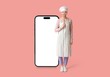 © Pixel-Shot - Thoughtful female chef with ladle and big mobile phone with blank screen on pink background