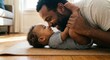 © Zhanna - Loving father bonding with baby son on floor at home, sharing smiles and tender moments in bright sunlight