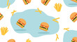 © Mimi - A delicious seamless pattern featuring cartoon hamburgers and golden french fries scattered on a light blue and white background.