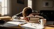 © Вадим Перегудов - Exhausted man resting head on books, tired student studying late, sunlit home office with copy space