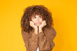 © carballo - young woman with afro hair thinking, isolated