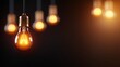 © LifeMedia - Bright idea shines through darkness in a sea of dim light bulbs