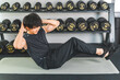 © buritora - Athlete male doing abdominal exercises, muscle training, workout, training at the gym
