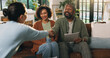 © WesJVR/peopleimages.com - Documents, handshake or meeting with couple and financial advisor in home living room for agreement. Consulting, thank you or welcome and mature people shaking hands with finance broker for deal
