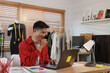 © crizzystudio - Young asian male fashion designer creating new collection