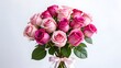 © bestphoto - Elegant bouquet of pink and white roses tied with a delicate ribbon.
