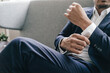 © Westend61 - Close-up of businessman adjusting his sleeves