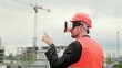 © Vlad - Work process on construction site with modern gadget