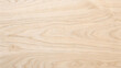 © Sabbir Media - Light beige natural wood grain texture background, closeup of smooth maple or ash surface with fine linear pattern