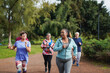 © Sabrina - Group of multiracial senior friends running at city park - Fit elderly people having fun doing sport endurance workout together outdoor