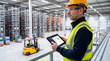 © soushiyant - Logistics Manager Using Tablet in Modern Automated Warehouse