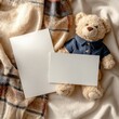 © DejaReve - A classic, preppy flat lay photograph with white cards and teddy bear