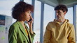 © stockbusters - Concerned partners calling cellphone in office room closeup. Stressed woman