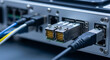 © indra - High-speed network connection with fiber optic cables and Ethernet plugged into advanced data processing hardware