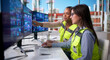 © Andrey Popov - Young Black Woman Engineers Monitor Automation Systems