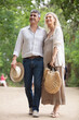 © auremar - a beautiful senior couple poses while walking