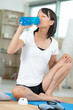 © auremar - beautiful  cheerful young sports woman drinking water