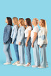 © Pixel-Shot - Beautiful women of different ages on blue background