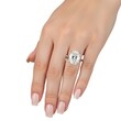 © Bulu - Elegant diamond ring with a large center stone and smaller side stones on a hand