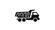 © M FAIZAL - Black silhouette of a dump truck.