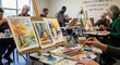 © Sonya - People painting watercolor landscapes and still life in a studio