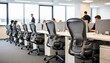 © CrazyJuke - Contemporary Workspace: A modern office environment showcases a well-lit, open-plan layout, with rows of ergonomic chairs and computer setups.