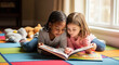 © MIQ - Two girls reading a book together diverse friendship learning and childhood development kids school