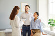 © Studio Romantic - Multiethnic positive couple listening female doctor sharing health advices related to pregnancy, infertility, or reproductive health. Fertility, family planning consultation in clinic concept