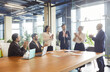 © Studio Romantic - Happy business people clap hands to celebrate success of presentation or negotiations, discussion of project. Corporate team meeting at table in boardroom, employees and partners applauding