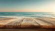 © Shahazadi - A weathered wooden table top overlooking a serene ocean view at sunset