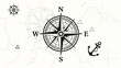 © Stock Image Paradise - Detailed illustration of a compass rose on a navigation map with an anchor symbol