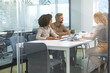 © ty - Creative business people, planning and meeting and brainstorming, ideas or strategy at office, view from glass wall