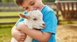 © Vasyl - Child hugs a goat on a farm during a sunny day in the afternoon
