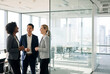 © soushiyant - Diverse Business Team Discussing Strategy in Modern Sunny Office with Copy Space