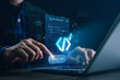 © Tee11 - Business professional using AI code generator interface on laptop, activating automated software development system. Concept of artificial intelligence and digital innovation in workspace.