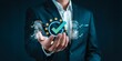 © Design Store - Businessman hand holding digital confirmation with checkmark and stars over documents for compliance quality assurance and verification services technology concept