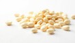 © Sutasinee - Scattered white beans on pure white background, design, picture