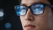 © shu - Closeup of person wearing smart glasses with digital display