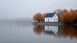 © niwat - House reflecting on the still lake during a foggy