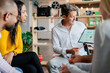 © Westend61 - Businessman leading a presentation in loft office