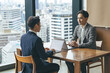 © metamorworks - ビジネス、面談、面接、相談、コンサルタント、コンサルティング、アドバイザー、商談、税理士、弁理士、メンター、サポート、手元、日本人、男性、室内、カフェ、ロビー、ノートパソコン、PC、DX、デジタルトランスフォーメーション、データ、分析、アドバイス、ディレクター、指導、指示、研修、オフィス、ビジネスパーソン、ビジネスマン、チームワーク、企業、経営、会話、会議、ミーティング、打ち合わせ、事業承継、引き