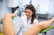 © Graphicroyalty - Pelvic exam at gynecologist office. Smiling female doctor in white coat performing cervical screening for young woman in clinic. Gynecological checkup, healthcare and reproductive medicine concept.
