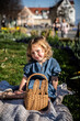 © ADDICTIVE STOCK - Young girl enjoying a sunny easter celebration outdoors