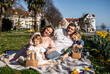 © ADDICTIVE STOCK - Family celebrating Easter during sunny spring picnic
