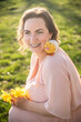 © ADDICTIVE STOCK - Cheerful woman enjoying springtime