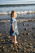 © ADDICTIVE STOCK - Child enjoying a sunny day at the beach