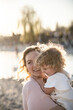 © ADDICTIVE STOCK - Mother and child enjoying a sunny day outdoors