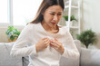 © Pormezz - Acid reflux disease, suffer asian young woman have symptom gastroesophageal, esophageal, stomach ache and heartburn pain hand on chest from digestion problem after eat food, Healthcare medical concept